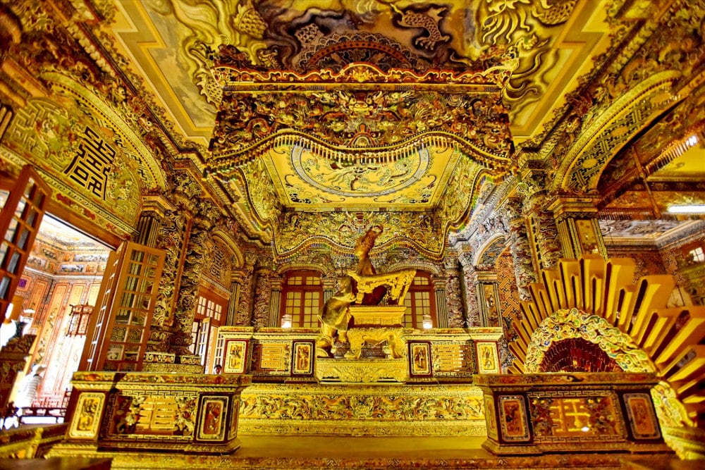Ascending further, visitors reach the Thien Dinh Palace, the centerpiece of the mausoleum
